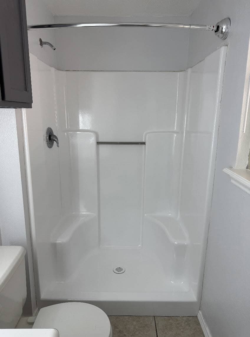 Resurfaced shower and tub combination